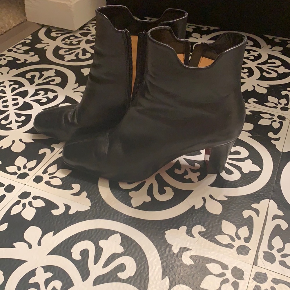Christian Louboutin ankle boots. Have been worn a lot. Lots of wear. Size 38
